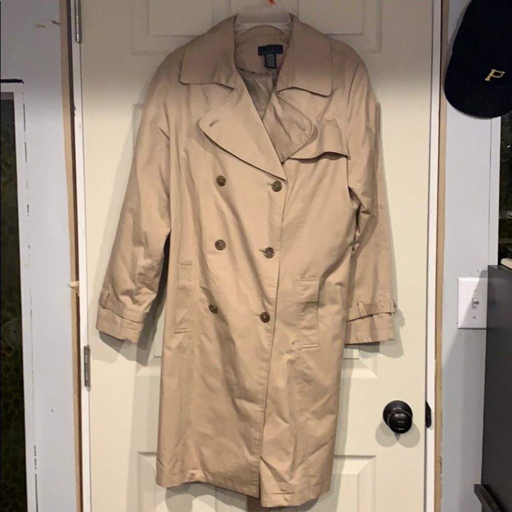 Tan raincoat measuring 42 inches long 24” pit to pit